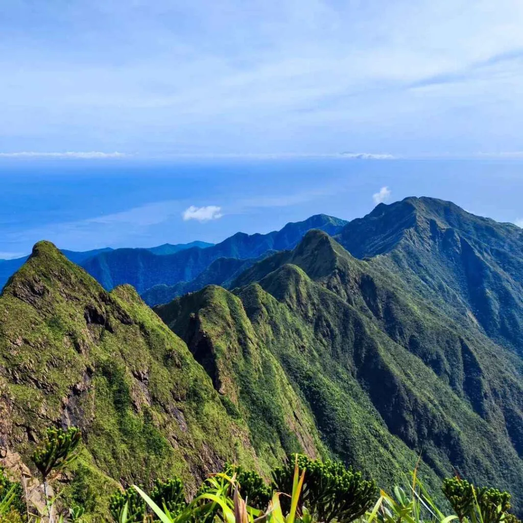 Jagged saw-toothed summit ridgeline of Mt. Guiting-Guiting rising above Sibuyan Island cloud cover