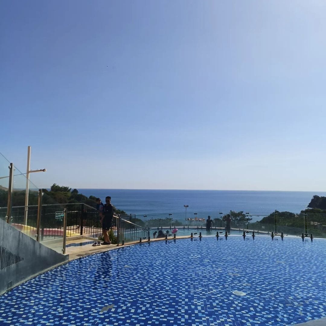 Bali-themed infinity pool at Aqua Fun Hotel overlooking the cove at Camaya Coast resort