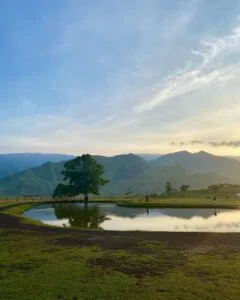 Panoramic view of Communal Ranch grasslands with Paminahawa and Kapayawan ridges in the background, Impasugong Bukidnon