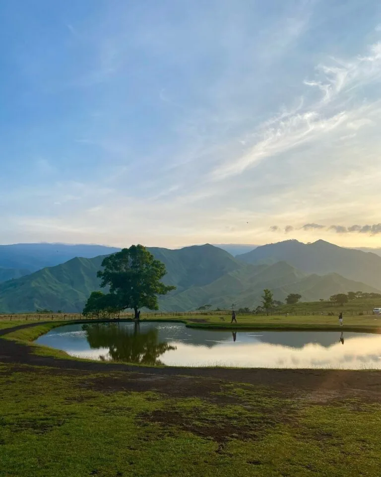 Panoramic view of Communal Ranch grasslands with Paminahawa and Kapayawan ridges in the background, Impasugong Bukidnon
