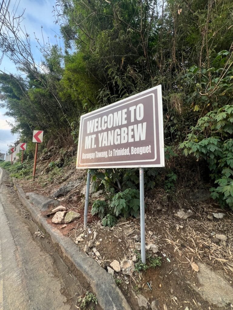 Welcome to Mt. Yangbew signage at the Sitio Binat Barangay Tawang registration and jump-off area