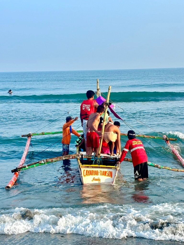 Wooden banca boat departing Tondaligan Boat Yard toward Pugaro Island on the Lingayen Gulf, Dagupan City