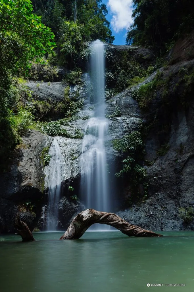 Tulali Falls multi-tiered waterfall flowing over natural rock ledges deep in Kapangan Benguet Cordillera forest