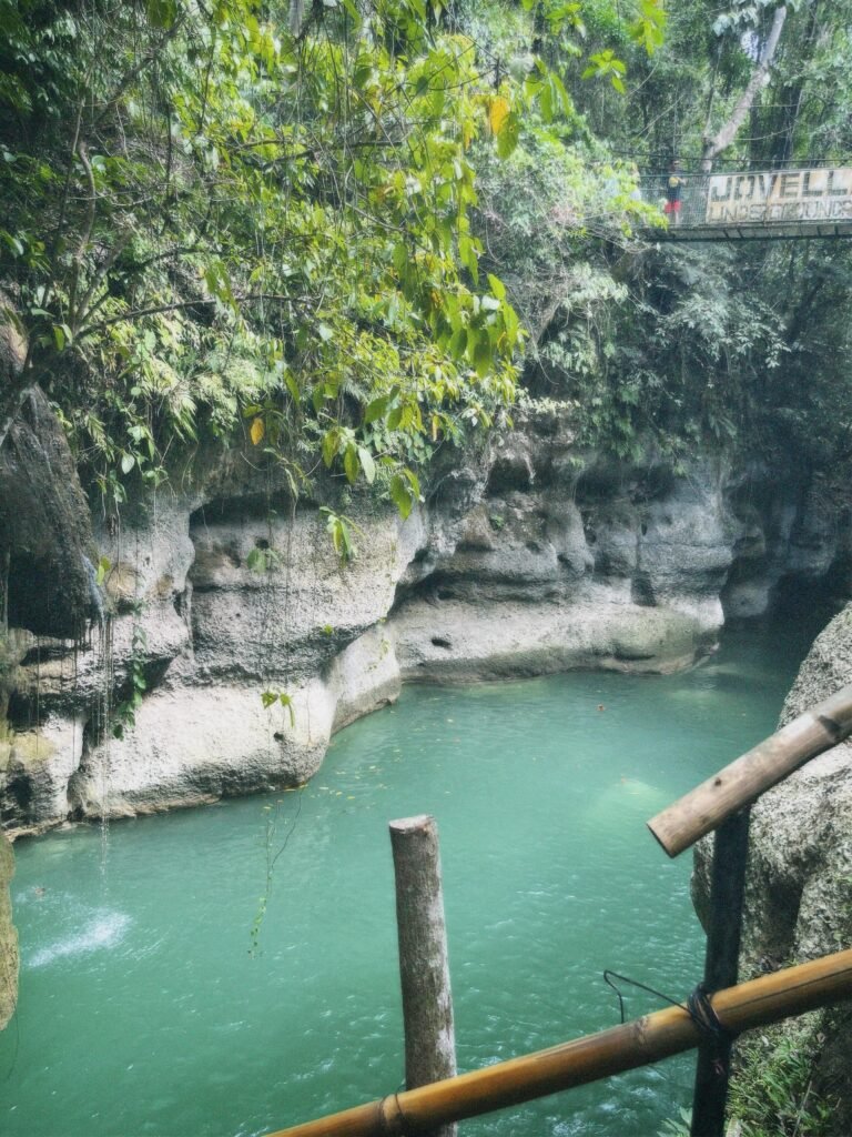 Steep limestone canyon walls flanking the Quipia River gorge below the Jovellar Underground River complex
