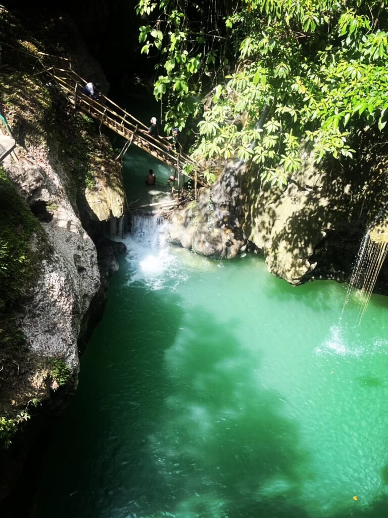 Steep limestone canyon walls flanking the Quipia River gorge below the Jovellar Underground River complex